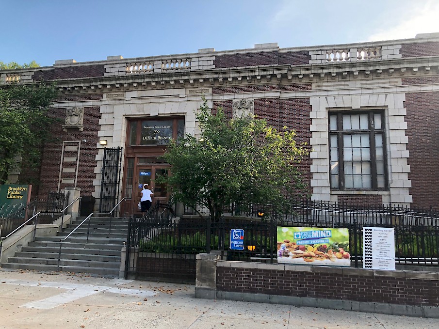 Woman enters New York City Cooling Center during a heat activation on Wednesday, August 8, 2018 at the Brooklyn Public Library – Bushwick Branch in Brooklyn, NY.