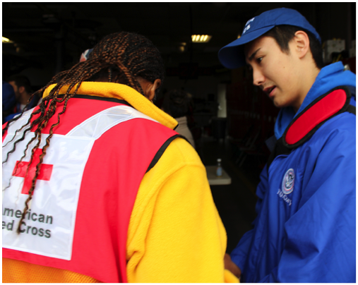 Fig. 2. FEMA Corps member Eddie Horwedel of Bayou 2, is working with the American Red Cross in preparing and managing a shelter in Missouri (Source: Paul Whitman/FEMA, June 2015).